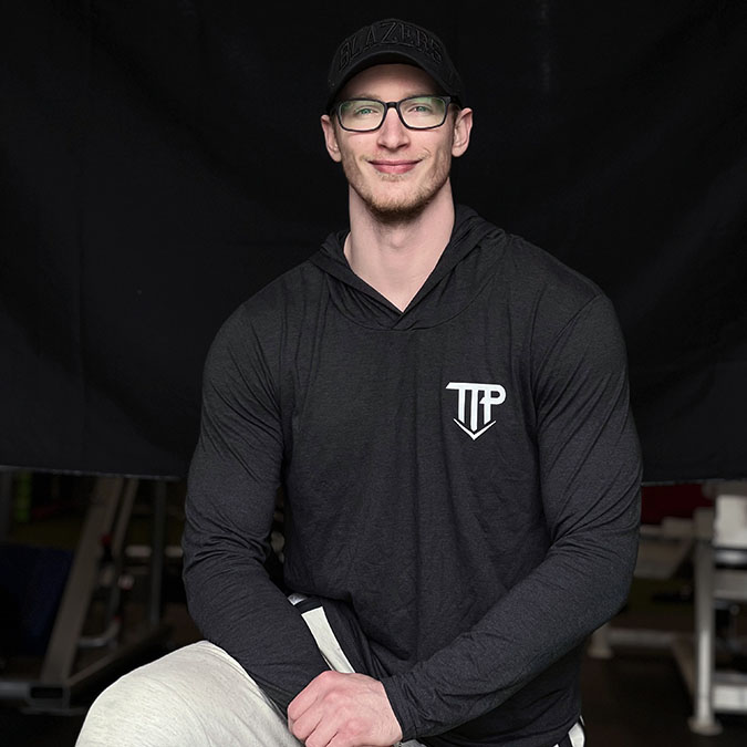TTP Fitness employee smiling.